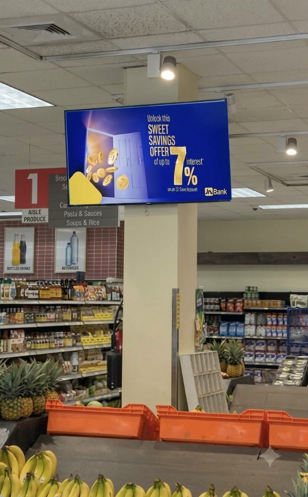 Indoor digital advertising screen in a supermarket